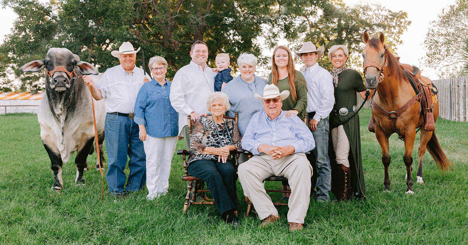 The Williams family with livestock at V8 Ranch